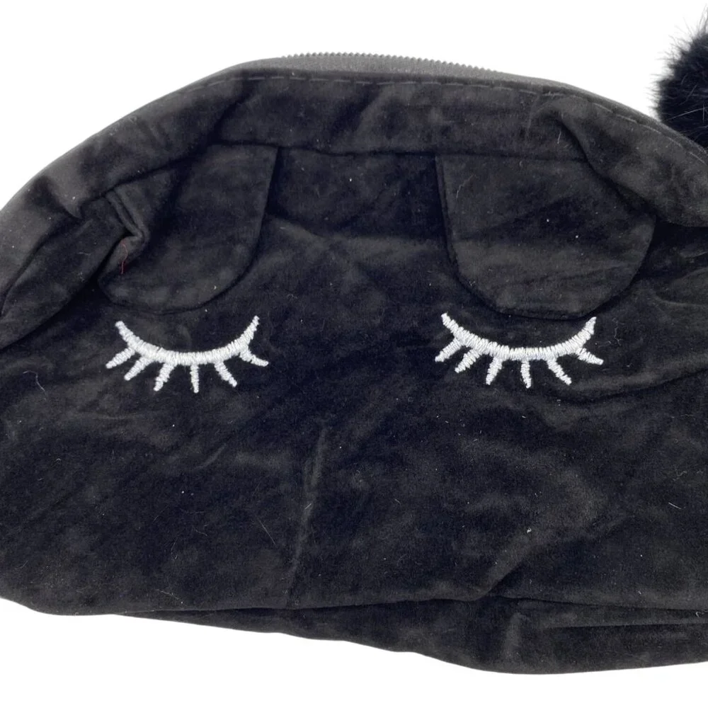 Black Velvet‎ Cosmetic Pouch With Embroidered Eyelash Design & Fluffy Pom Pom